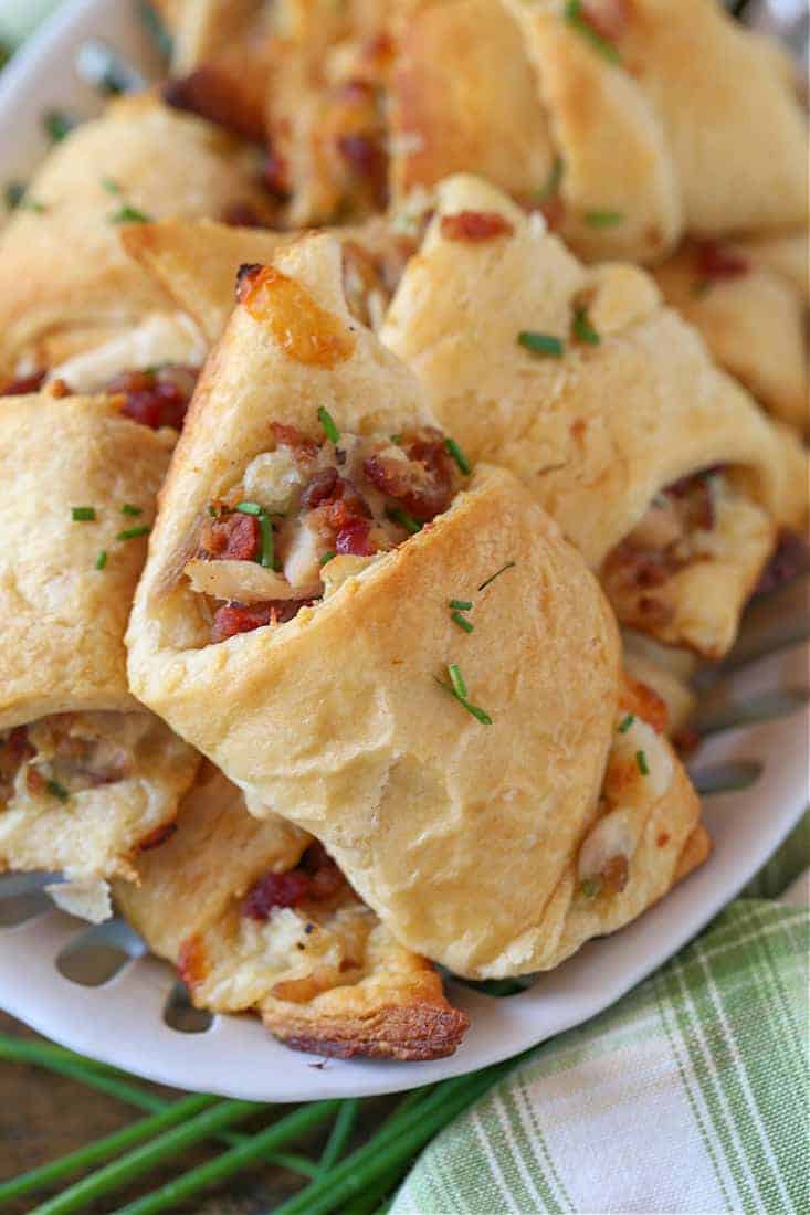 Bacon Ranch Chicken Crescent Rolls stacked in a basket