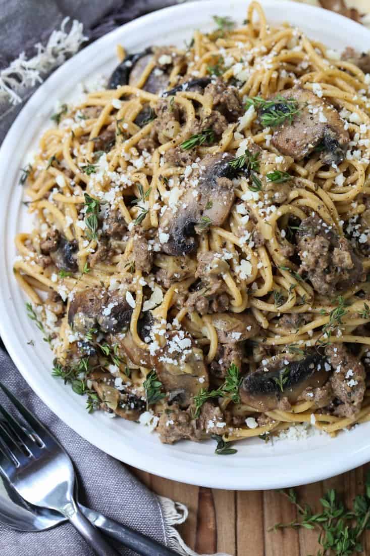 Beef and Mushroom Spaghetti on a plate with forks