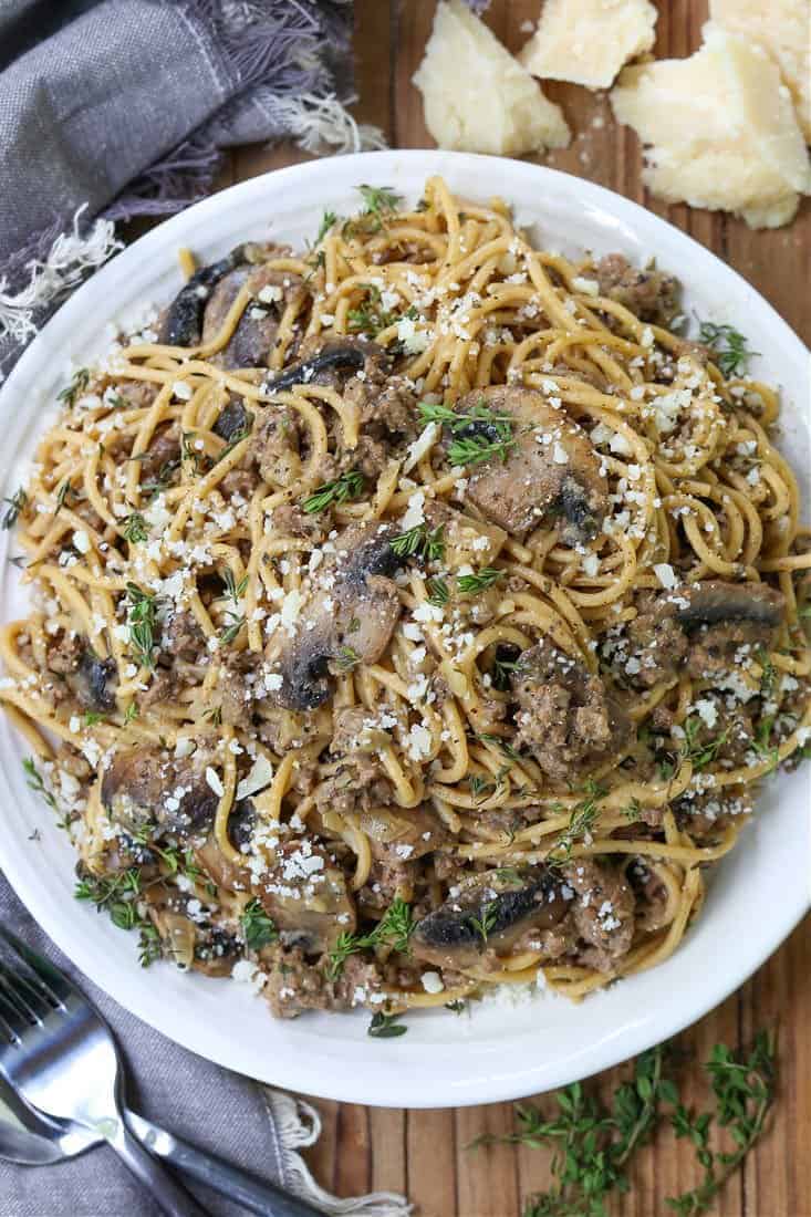 Spaghetti with ground beef and mushrooms on a plate