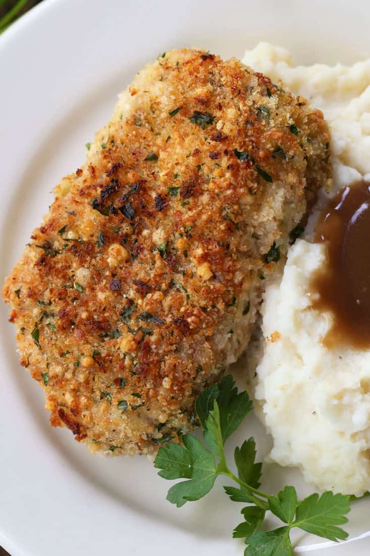 Crispy Oven Baked Pork Chops on a dinner plate