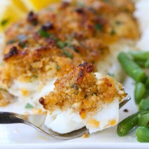 Parmesan Crusted Haddock recipe with a bite on a fork