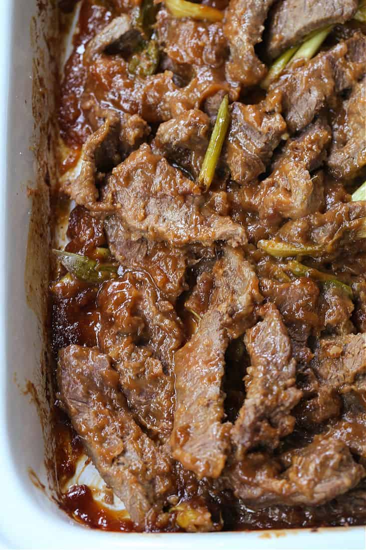 Slow Cooker Mongolian Beef in a crock pot with sauce