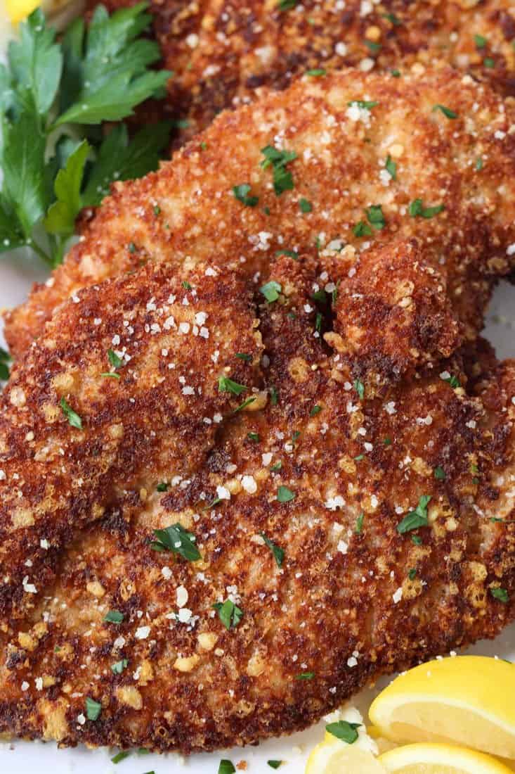 Breaded chicken cutlets with grated parmesan cheese