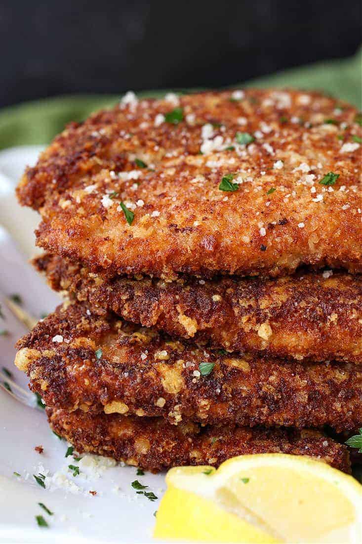Flat Chicken is a breaded chicken cutlets with parmesan cheese and whole wheat bread crumbs