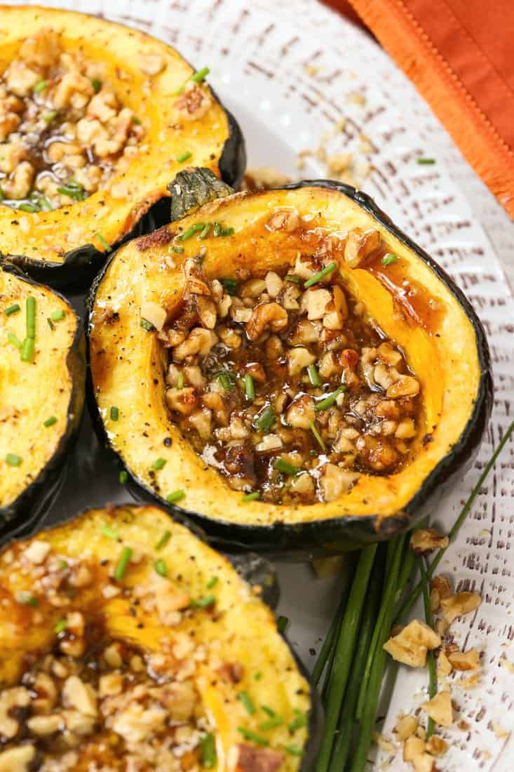 Acorn squash roasted and filled with brown sugar, walnuts and butter.