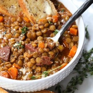 Lentil Soup with Ham in a bowl with spoon