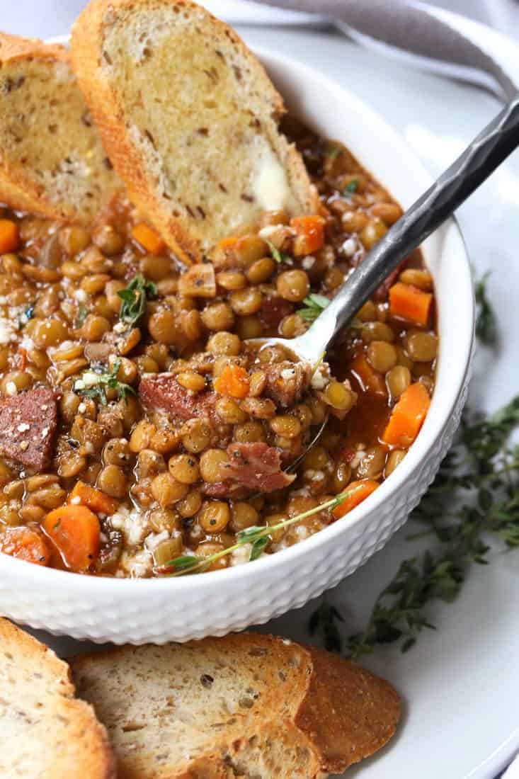 Lentil Soup with Ham in a bowl with spoon