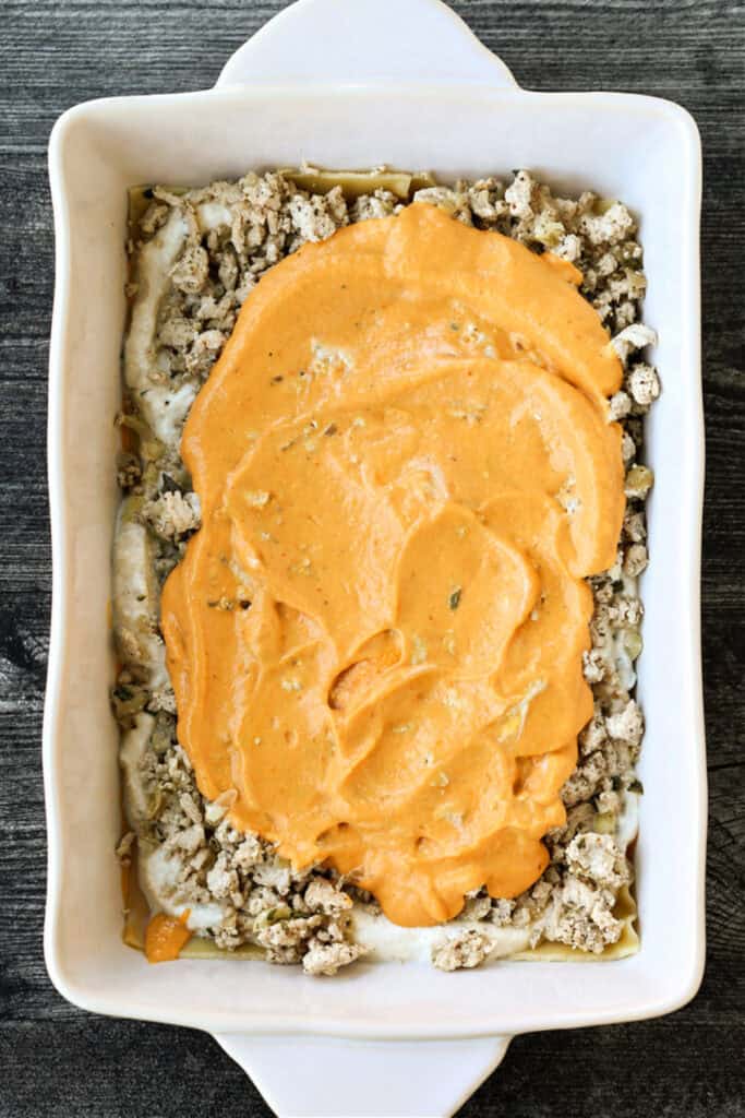 ground turkey lasagna layered with pumpkin alfredo