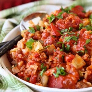 Bowl with cabbage roll casserole and green napkin