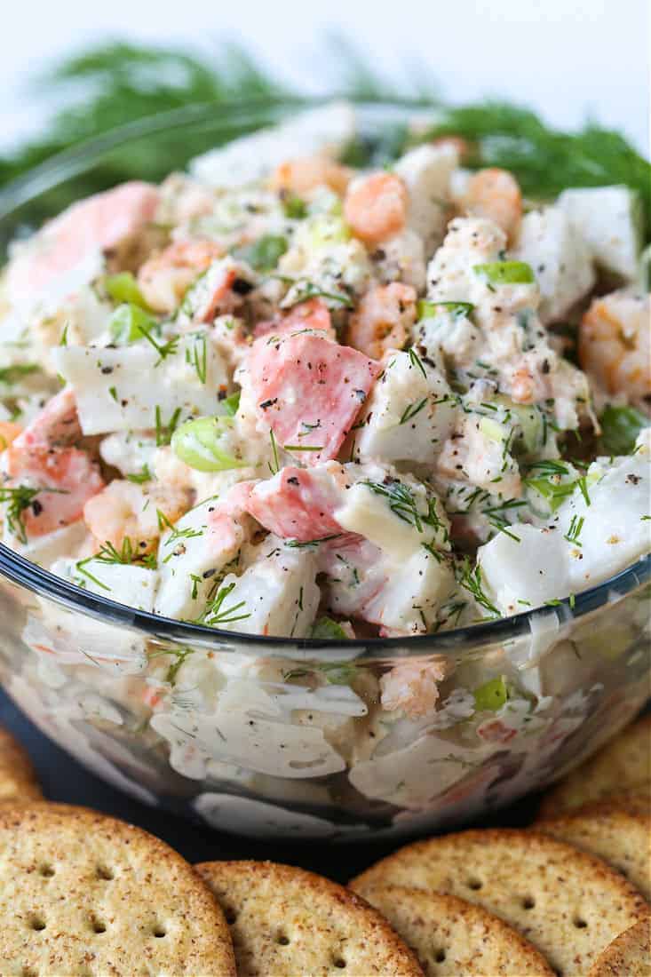 seafood salad in a clear glass bowl