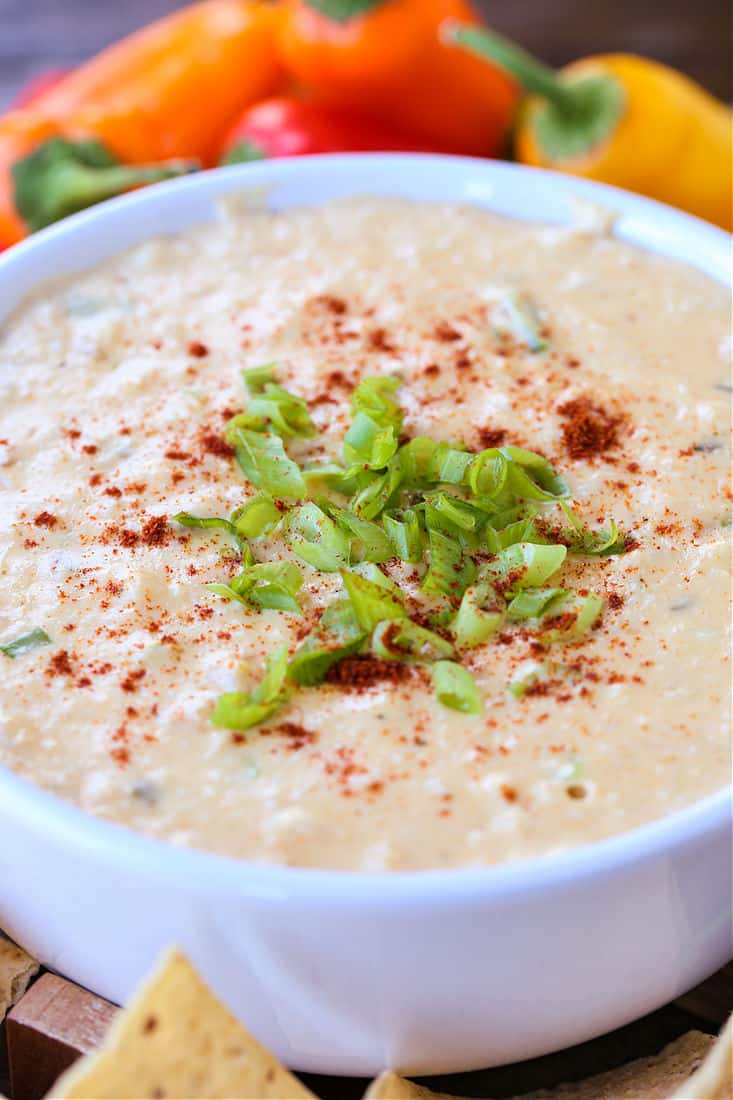 Spicy hot crab dip topped with scallions 