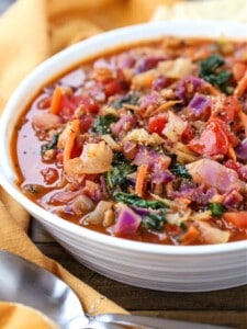 Soup recipe with cabbage, fresh spinach, carrots and tomatoes