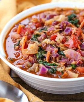 Soup recipe with cabbage, fresh spinach, carrots and tomatoes