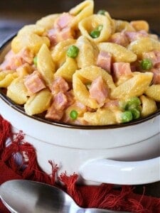 Macaroni and cheese with ham in a white bowl