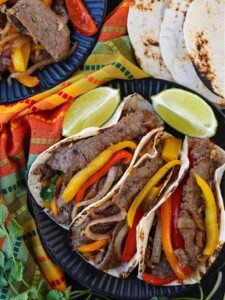 Fajitas on a plate with all the fixings