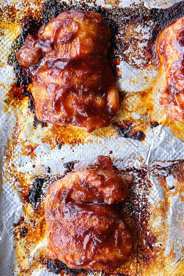 BBQ boneless chicken thighs on a sheet pan