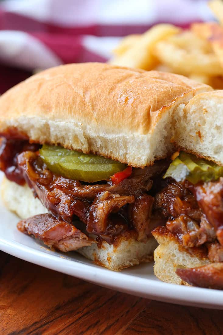 BBQ rib sandwich with shredded meat and pickles