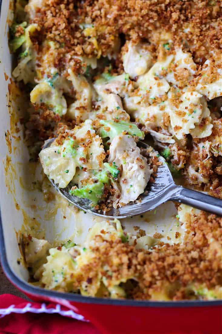 Chicken casserole with pasta and broccoli with a spoon