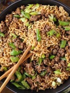 Ramen noodle bowl with ground beef and sugar snap peas