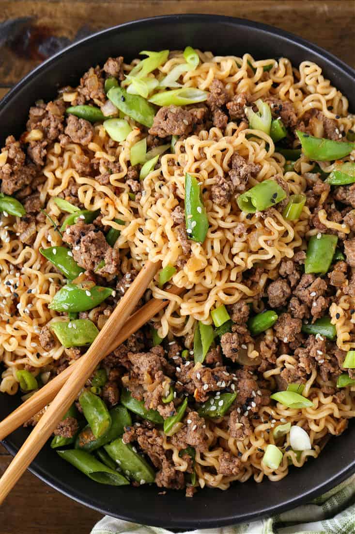Ramen noodle bowl with ground beef and sugar snap peas