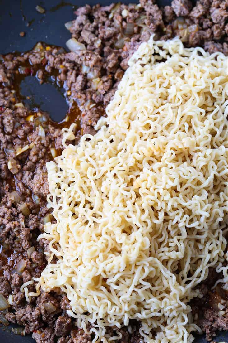 Ramen noodles and ground beef in a skillet