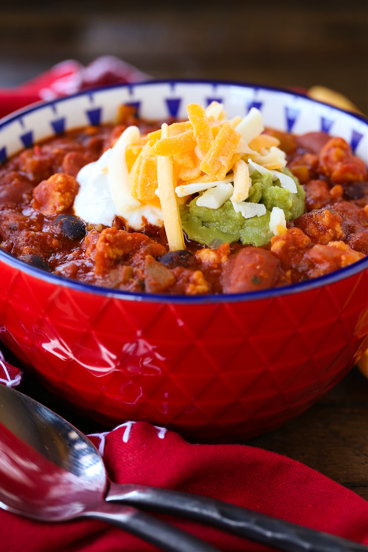 chicken chili in a bowl with toppings