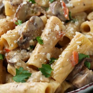 Rigatoni recipe with mushrooms and grated parmesan cheese