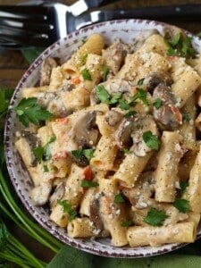 Rigatoni pasta with mushrooms in a wine cream sauce