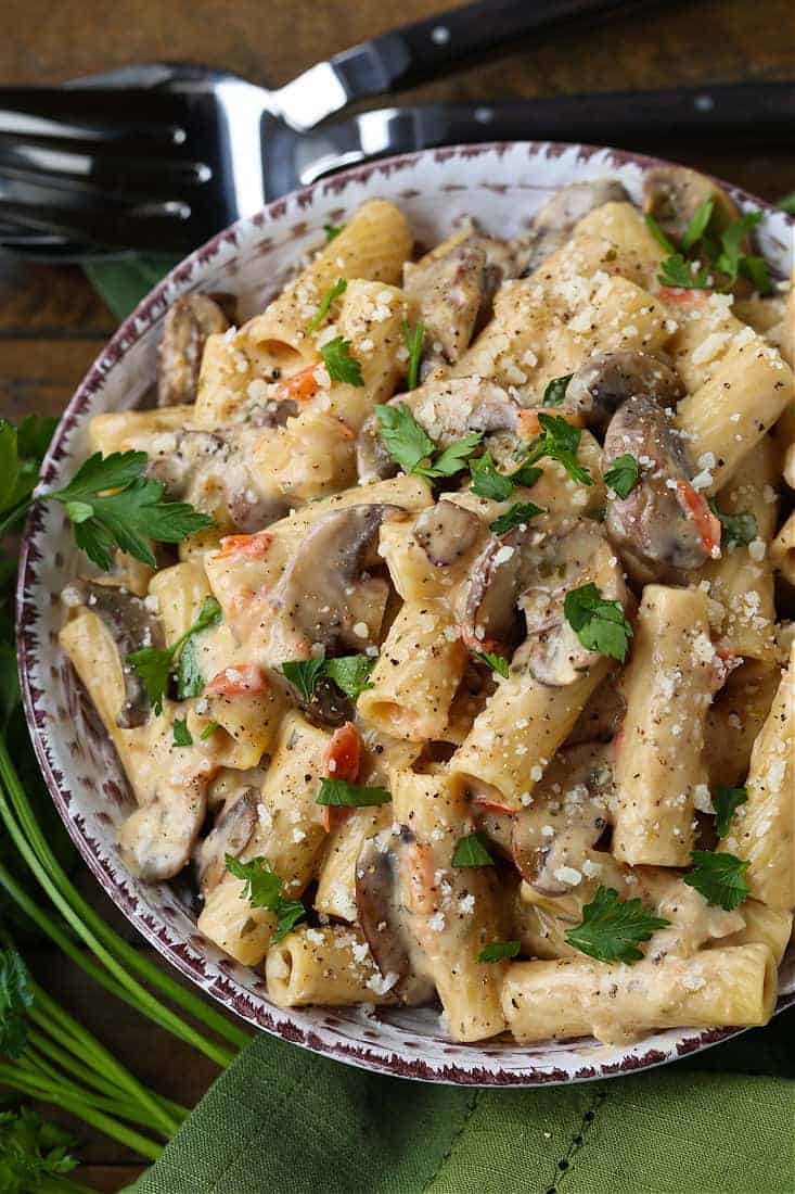 Rigatoni pasta with mushrooms in a wine cream sauce