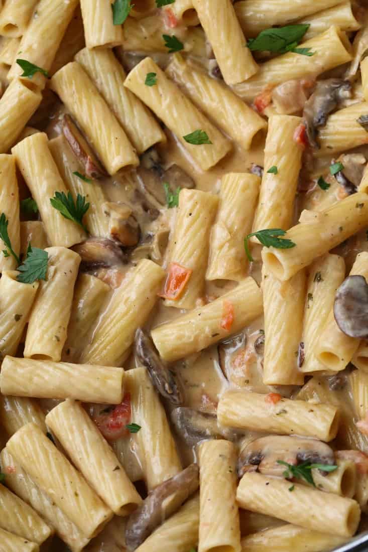 Pasta and mushrooms in a cream sauce in a large skillet