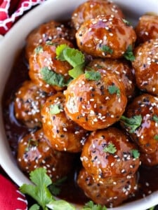 Teriyaki Meatballs in a bowl with red napkin