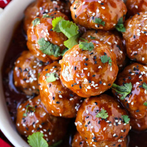 Teriyaki Meatballs in a bowl with red napkin