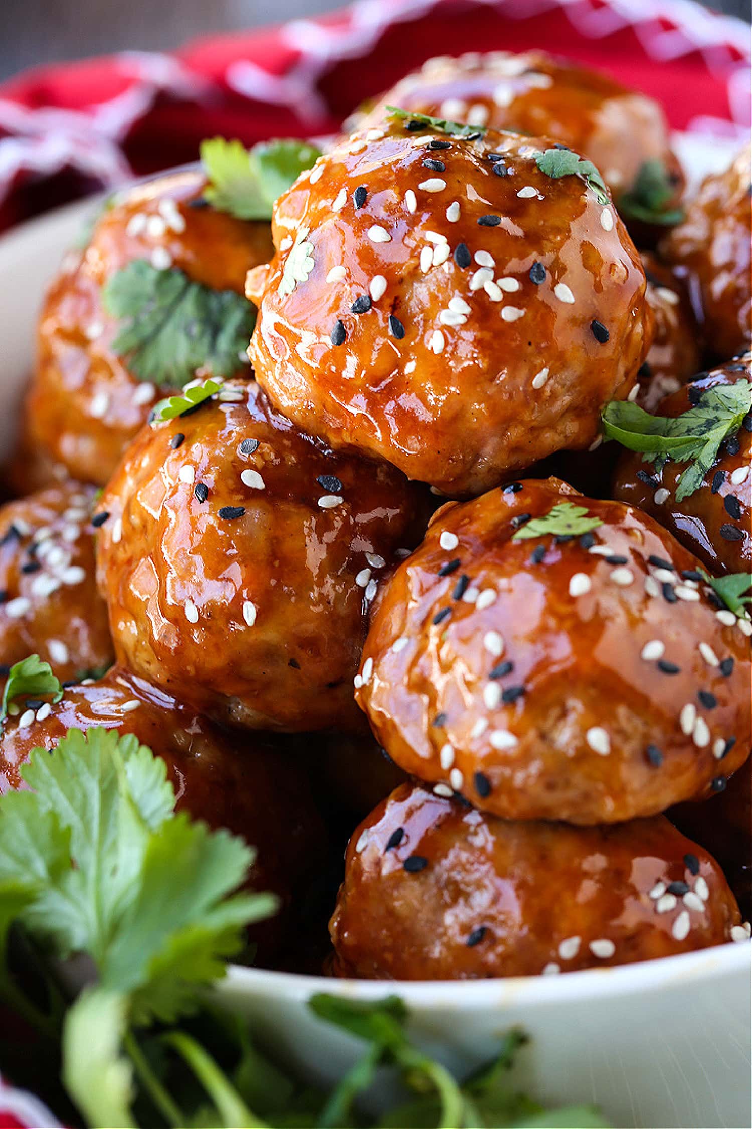 A Teriyaki Meatball recipe in a bowl with cilantro