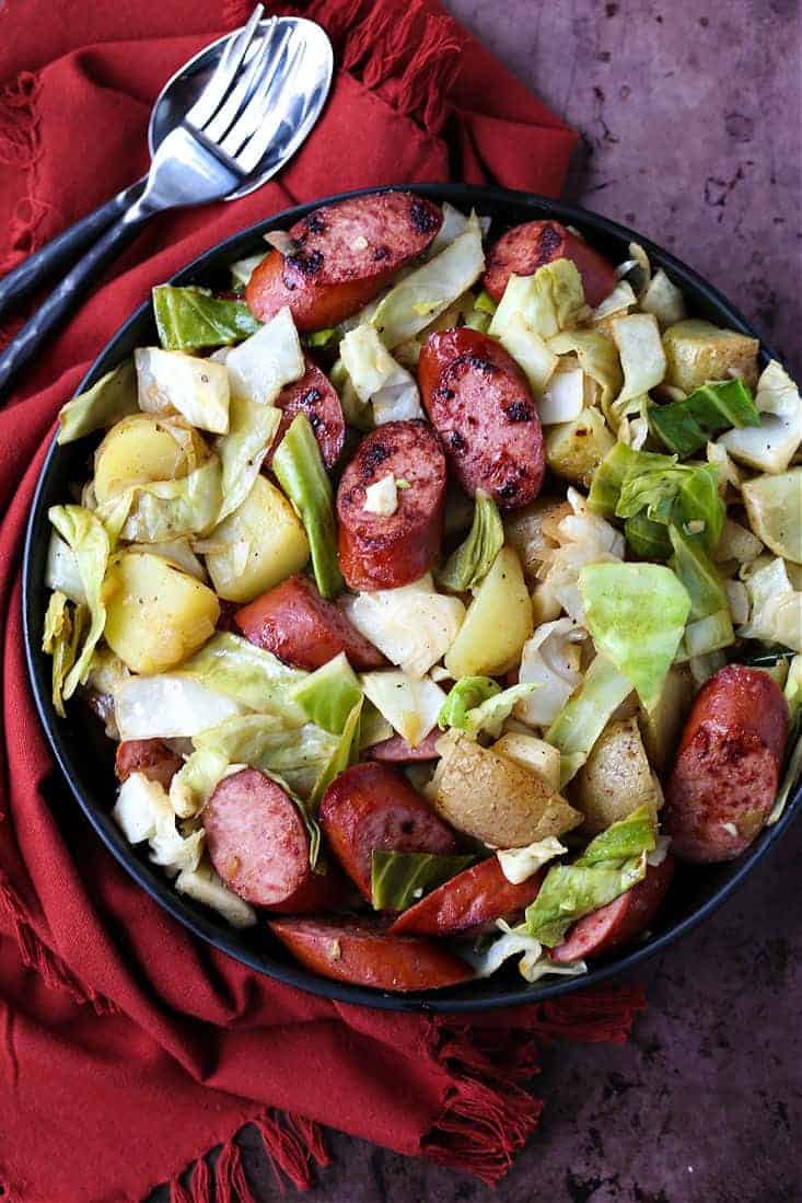 Kielbasa dinner with cabbage, potatoes and onions