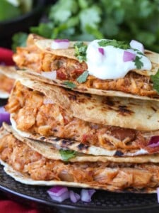 Air Fryer Tacos stacked on a plate