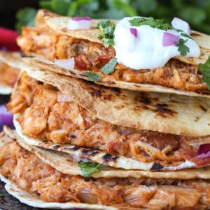 Air Fryer Tacos stacked on a plate