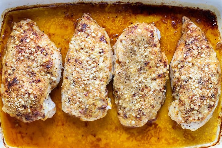 Baked chicken breasts with a parmesan cheese topping
