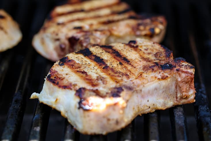 grilled pork chops on the grill