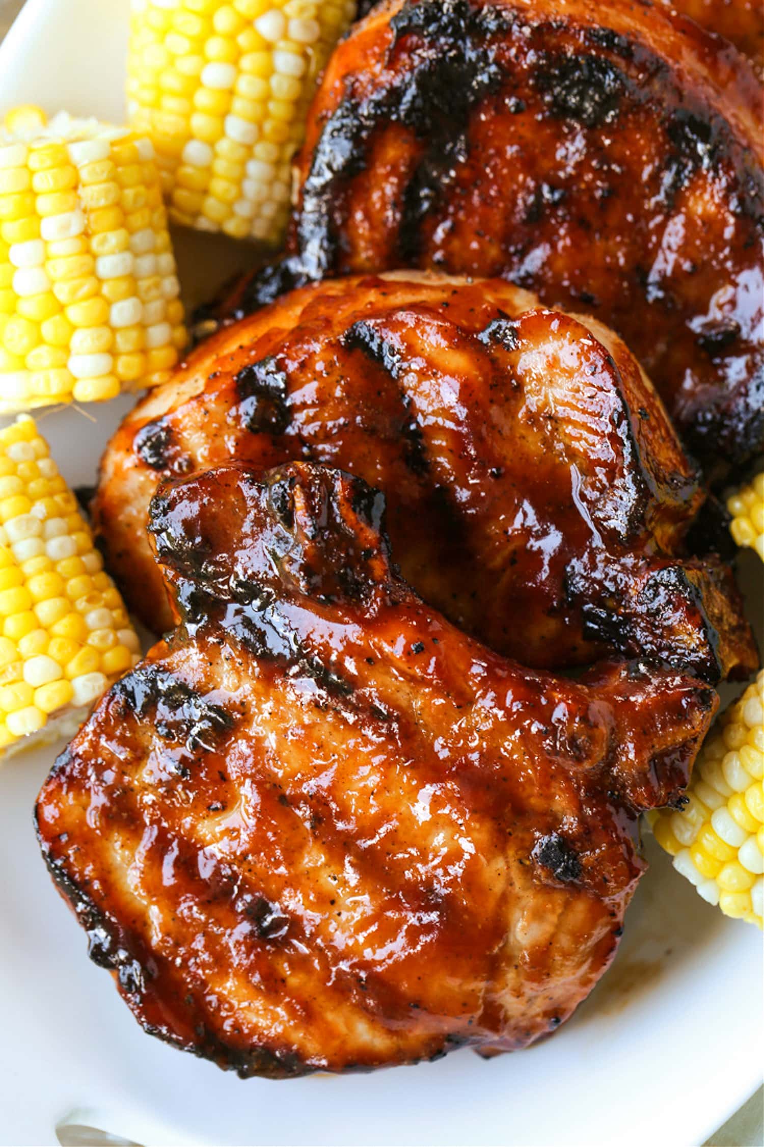 grilled bbq pork chops on a platter