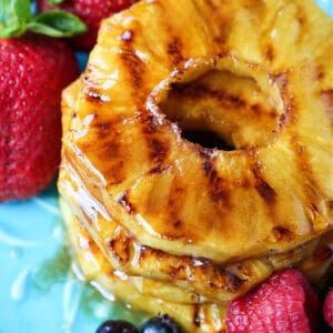 grilled pineapple with berries on the side