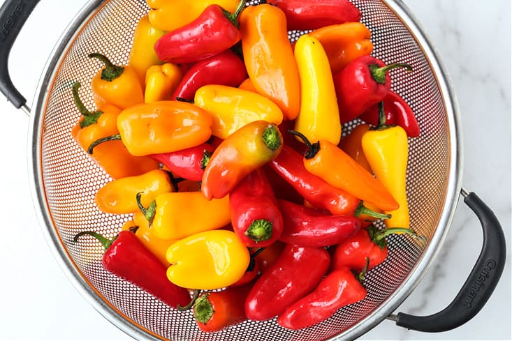 mini peppers in a colander