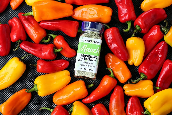 peppers with ranch seasoning on a baking sheet