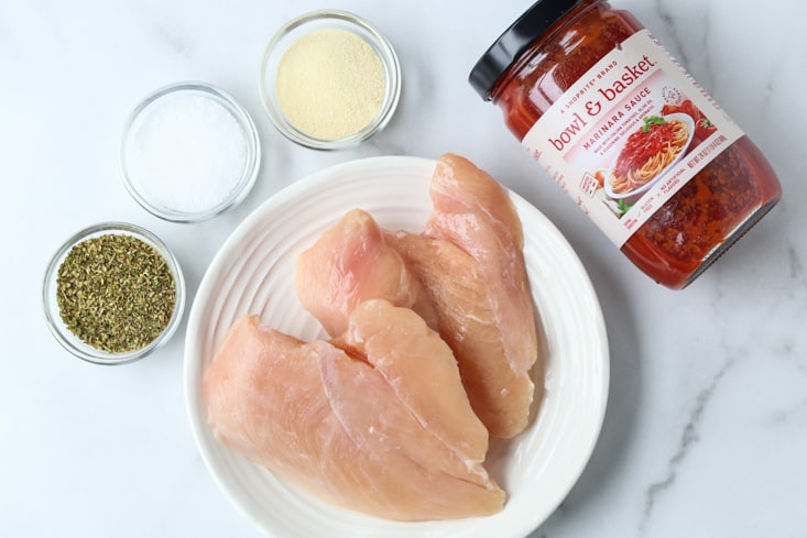 Ingredients to make shredded chicken sandwiches in slow cooker