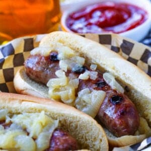 Grilled bratwurst topped with onions