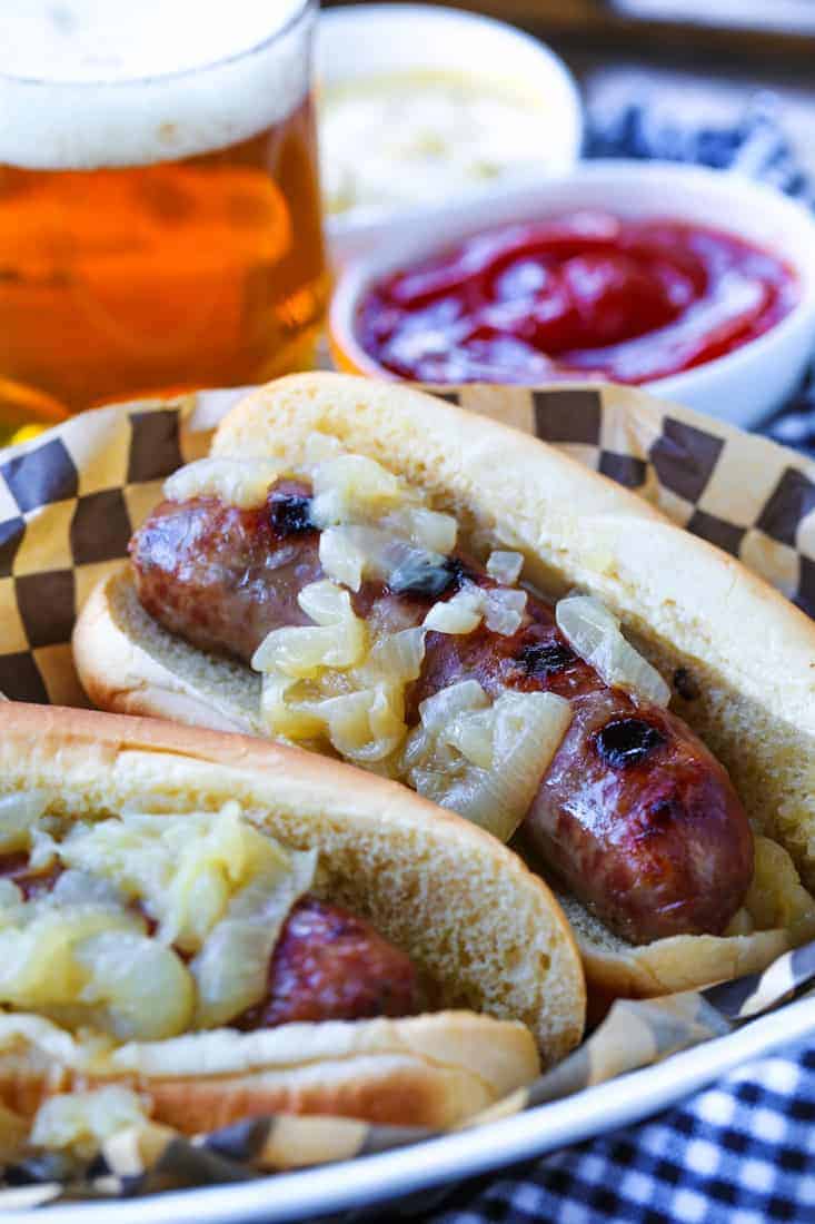 Grilled bratwurst topped with onions