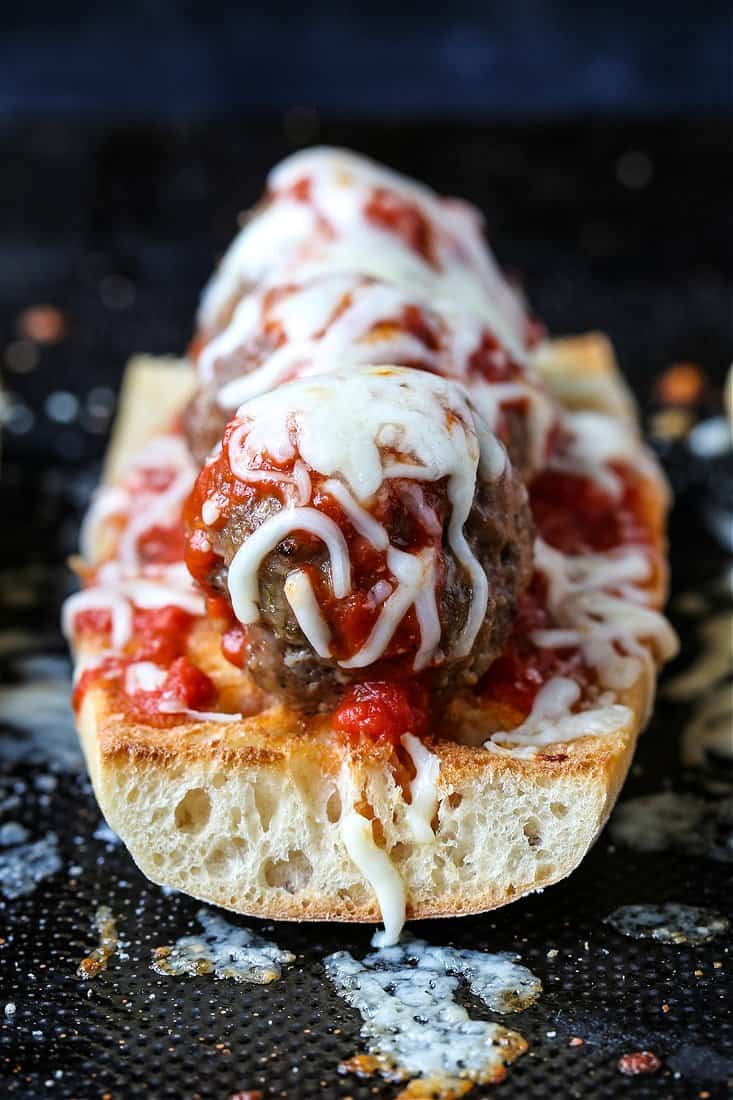 meatball parmesan sub with melted cheese after cooking