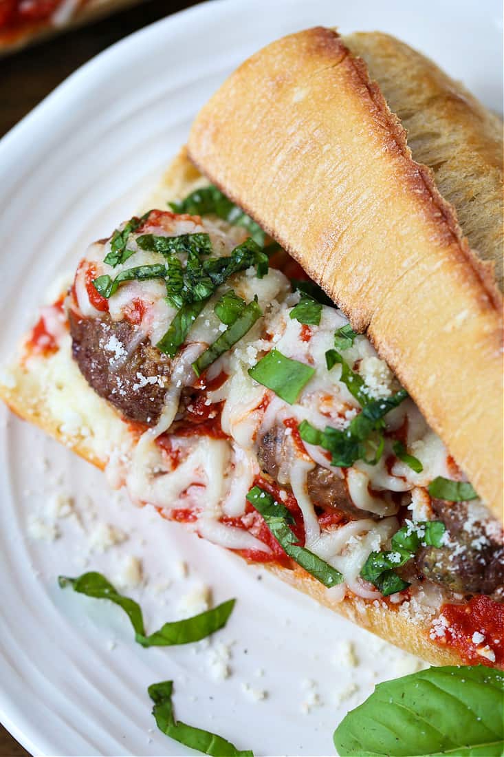 meatball parm sub on a plate from the top
