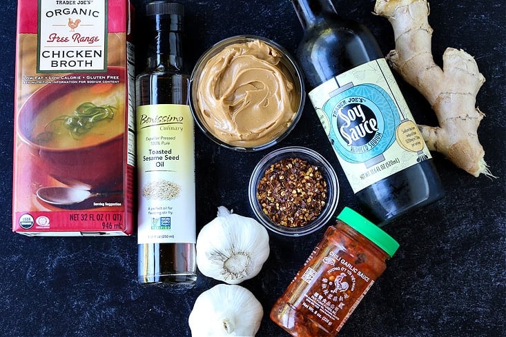 This is our go-to Peanut Sauce Recipe for using in many different recipes! A creamy, savory dip for veggies, a sauce for pasta or salads, or a drizzle over chicken or steak! INgredients for making homemade peanut sauce
