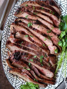 teriyaki steak sliced on serving platter