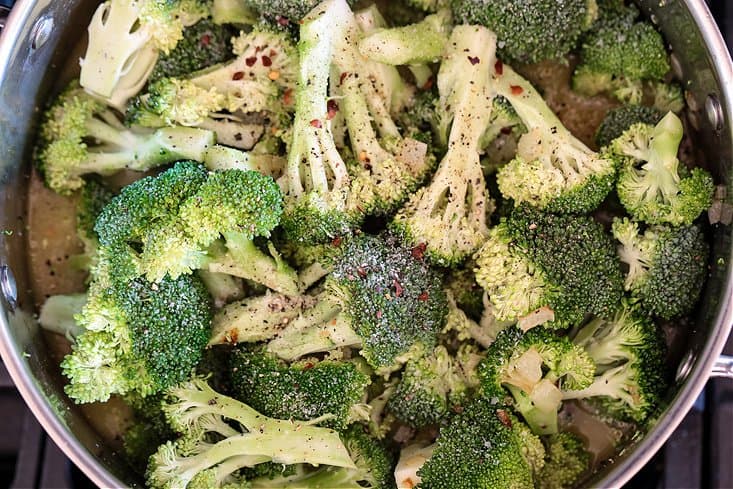 seasoning on chopped broccoli for making cream of broccoli soup